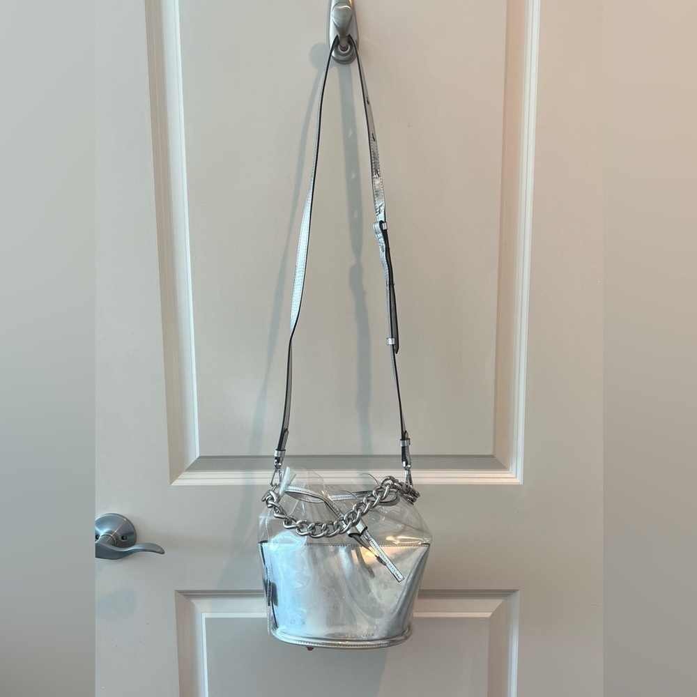 Kendall & Kylie Metallic Drawstring Crossbody Bag In Clear